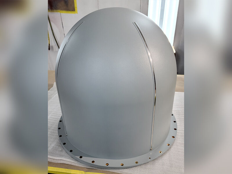 Satcom aircraft radome. Grey radome with lightning diverters. Taken in a warehouse environment