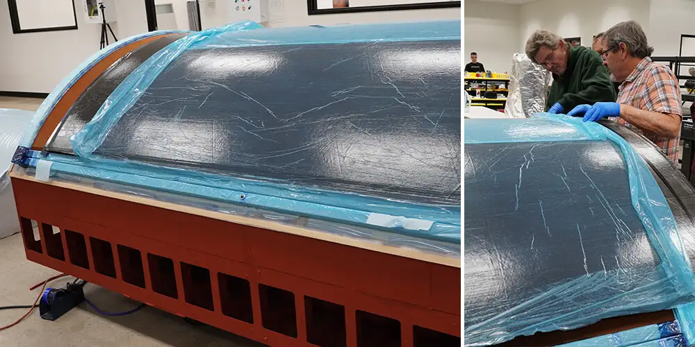 Layup of large, curved, carbon fiber panel with honeycomb core