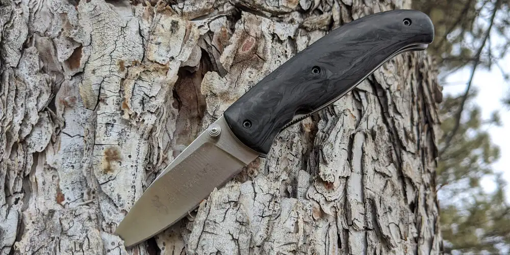 Small knive with custom forged carbon handle